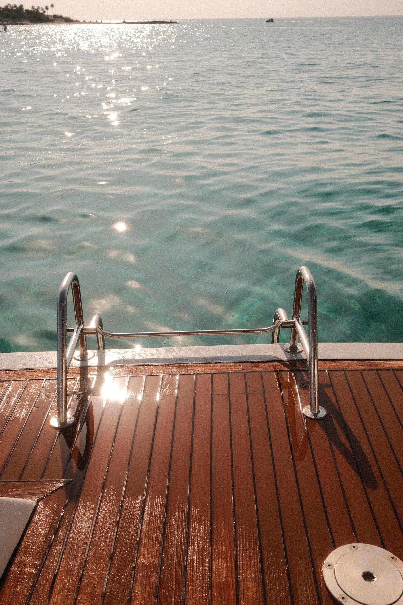 Teak platform, golden water